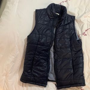 This beautiful never worn vest needs a new home.